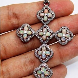 Gorgeous opal and diamond cross